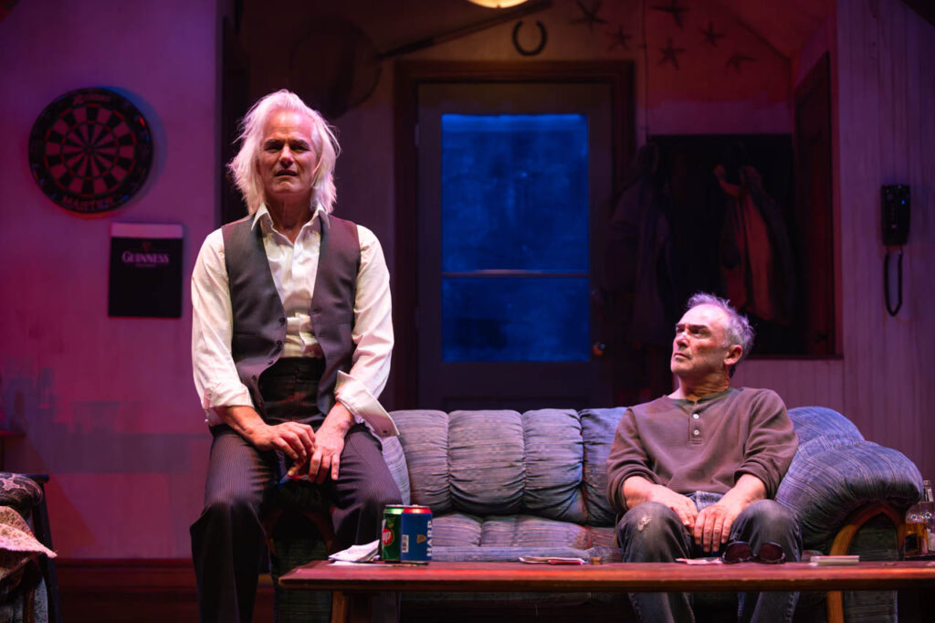 Paul Gross and Shaun Smyth in Alberta Theatre Projects’ production of The Seafarer. Photo by Benjamin Laird. Set & Props Design by Hanne Loosen. Costume Design by Ralamy Kneeshaw. Lighting Design by Anton deGroot.