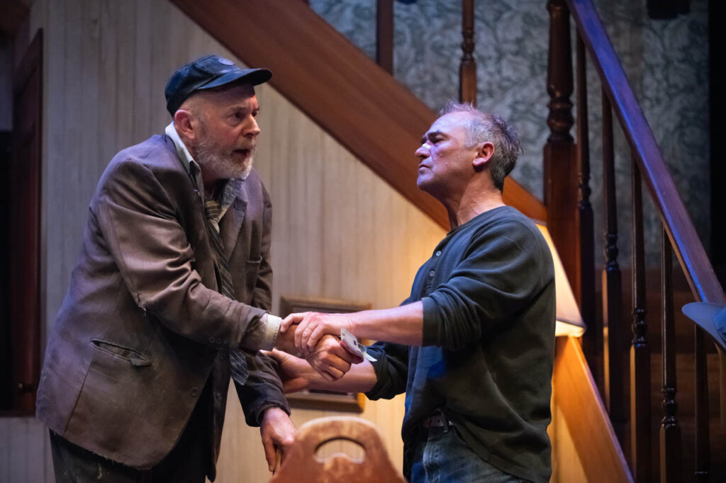 Christopher Hunt and Shaun Smyth in Alberta Theatre Projects’ production of The Seafarer. Photo by Benjamin Laird. Set & Props Design by Hanne Loosen. Costume Design by Ralamy Kneeshaw. Lighting Design by Anton deGroot.